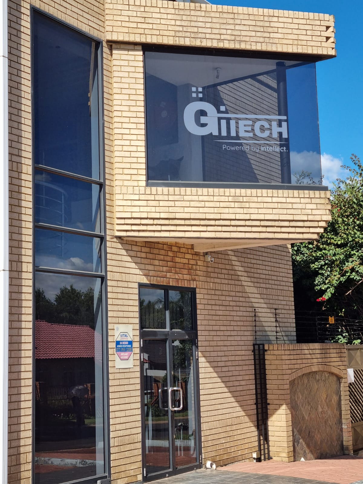 GITECH office exterior with branded window